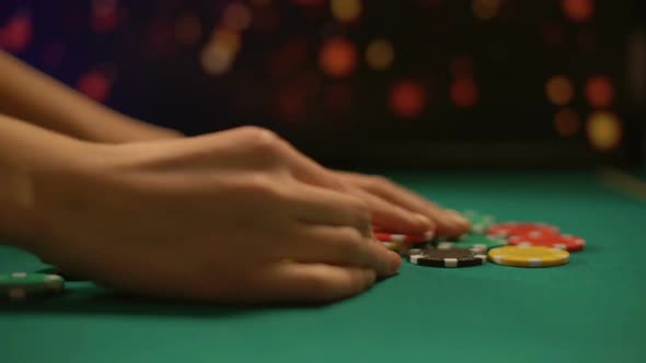Greedy Female Poker Player Taking Gambling Chips From Table, Winning Game