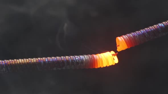 Metallic cable tubes can't handle electric current and break, causing a fire. In slow motion.