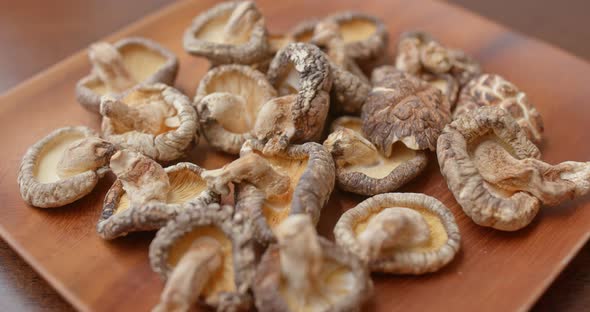 Dry of the mushroom on wooden plate