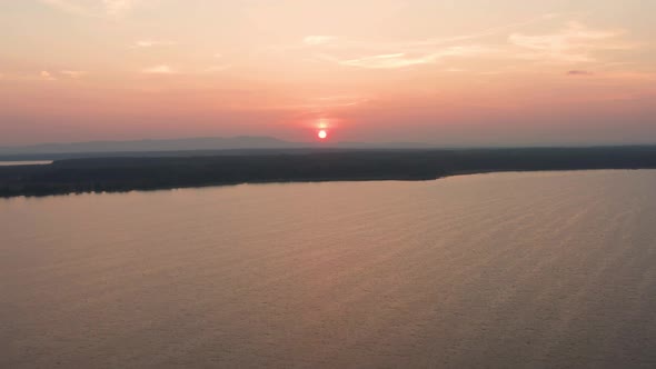 Aerial View of the Sunset Over the Lake