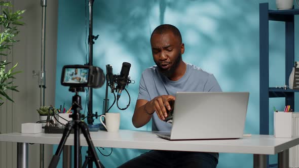 African American Influencer Reviewing Vr Glasses on Camera