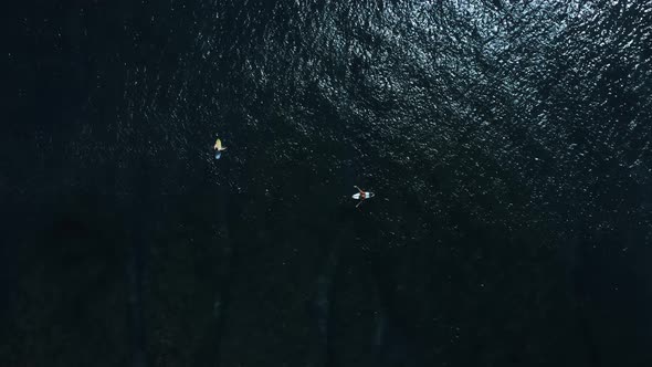 Birds Eye on Surfers Waiting Wave on Lineup