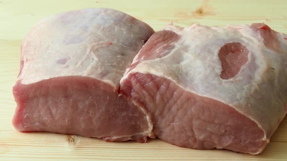 Fresh pork meat on wooden board	