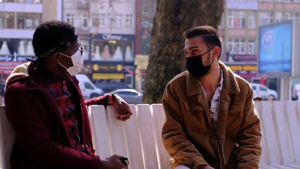 Black and White Mask Young Man Talking