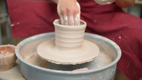 Handicraft the Potter Makes a Pitcher Out of Clay Closeup View of the Hands Production of Handmade