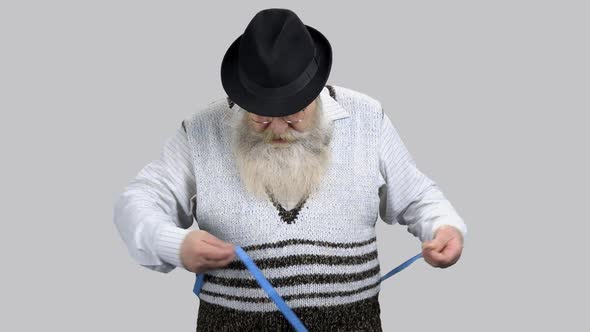 Old Thick Man Measuring His Waist and Feels Sadness