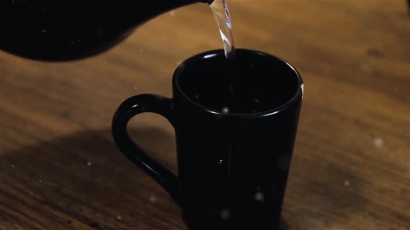 Partially Dissolved Coffee, Pouring Hot Water onto Instant Coffee.