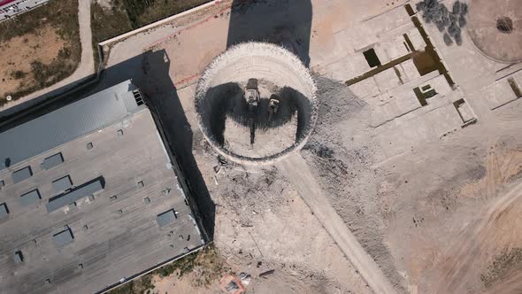 Destroying Old Concrete Industrial building on Construction Site