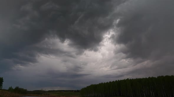 Dark Storm Clouds Moving Over Forest Timelapse