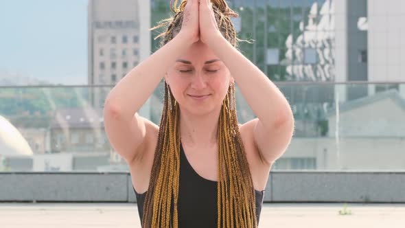 Woman Practicing Yoga Doing Namaste