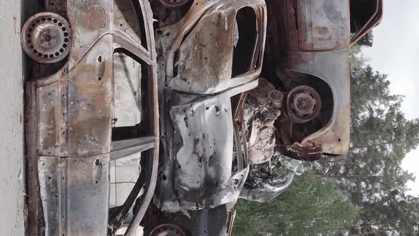 Vertical Video of a Dump of Wardestroyed Cars in Ukraine