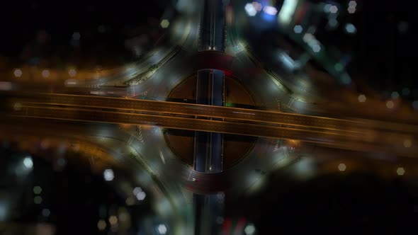 4K : Aerial view shot of fast moving above roundabout