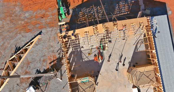 Detail of Roof Crane Holds Wood Framing Rafter Truss System Timber Frame Constructed Building