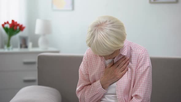 Aged Female Holding Hand on Chest, Suffering From Heart Pain, Health Problems