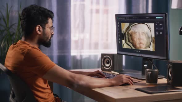 Indian Man Editing Cosmonaut Photo