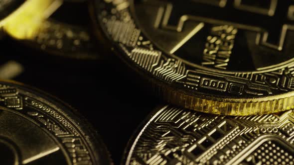 Rotating shot of Bitcoins (digital cryptocurrency) - BITCOIN 0597