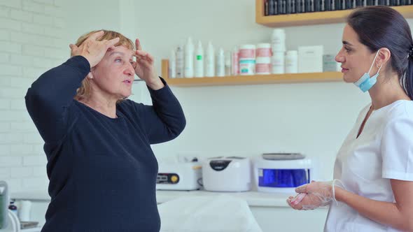 Cosmetologist Doctor Asks a Woman About What She Wants to Change