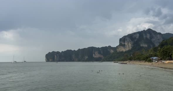 Time Lapse of Rain Clouds Over Beach and Sea Landscape with Boats. Tropical Storm in Ocean.