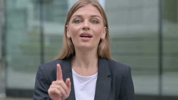 Businesswoman Pointing at the Camera