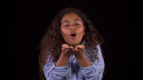 Cute Girl Blowing Glitter