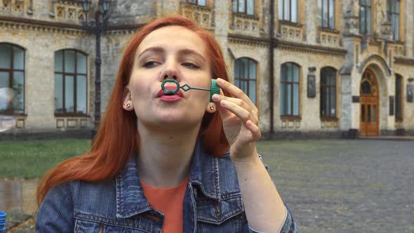 Girl Blowing Bubbles