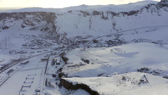 Vik Town and Church in Iceland with Ocean Views Seen From the Air