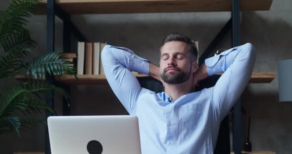 Portrait of Businessman Resting in His Chair