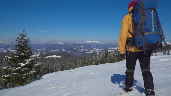 Man Backpacker Tourist Walking Snow Landscape