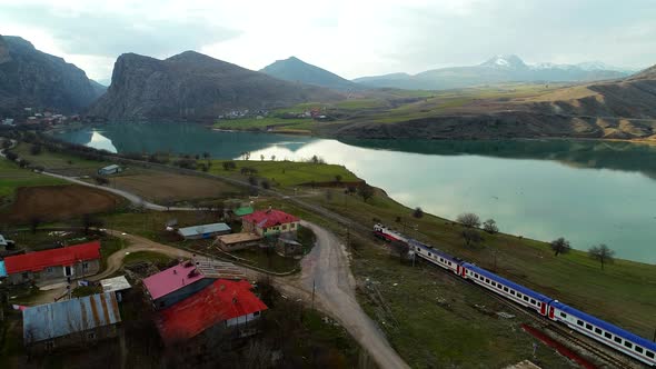 Train Passing Town