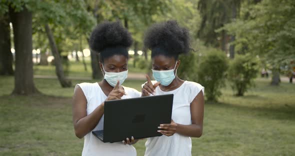 Two Black Girls Students with Laptop in Park