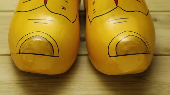 Traditional pair of Dutch wooden shoes close up