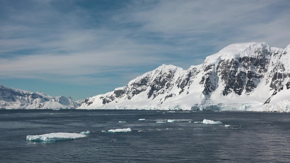 Arctic landscape with mountains, icebergs and glaciers. Climate Change and Global Warming