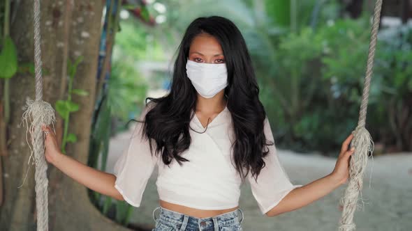 Beautiful Asian Woman Wearing Surgical Face Mask