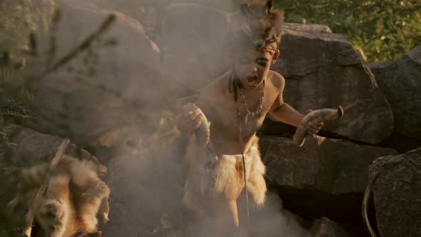 Shamans Boy at the Fire