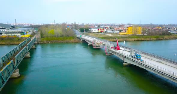 A Bridge Over the River with a Part Under Construction