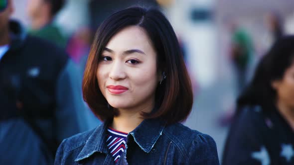 Sexy chinese woman smiling at the camera