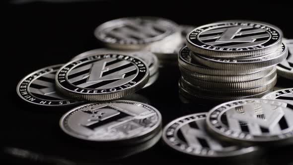 Rotating shot of Bitcoins (digital cryptocurrency) - BITCOIN LITECOIN 378