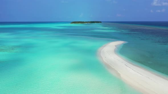 Wide angle overhead travel shot of a summer white paradise sand beach and blue water background in h