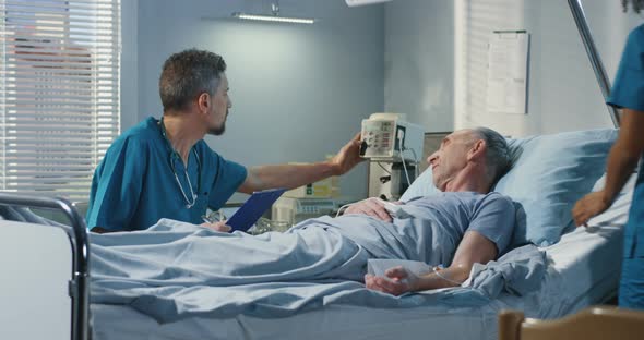 Doctor Visiting Patient in Hospital