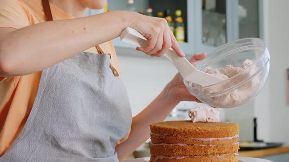 Woman Cooking Food and Baking on Kitchen at Home