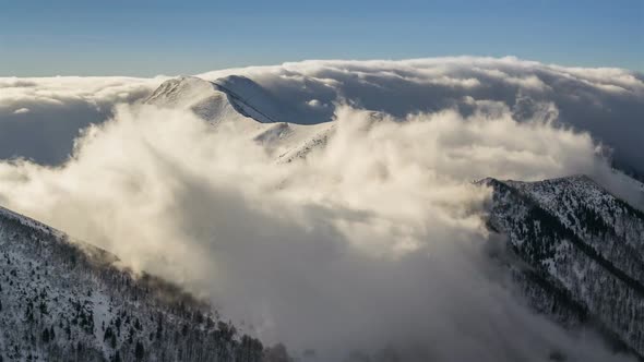 Clouds Flying over Winter Mountain