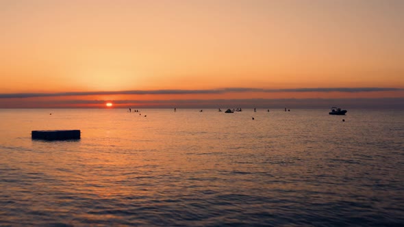 Sunrise Ocean with Orange Sky