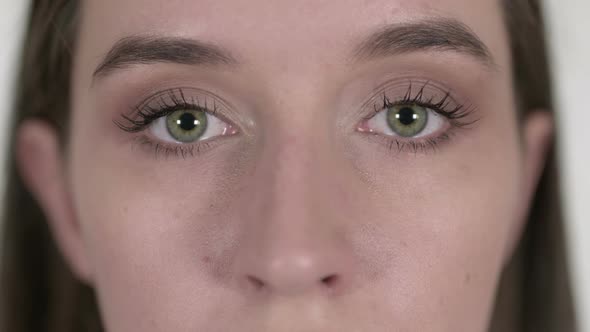 Close Up of Blinking Eyes of Young Woman