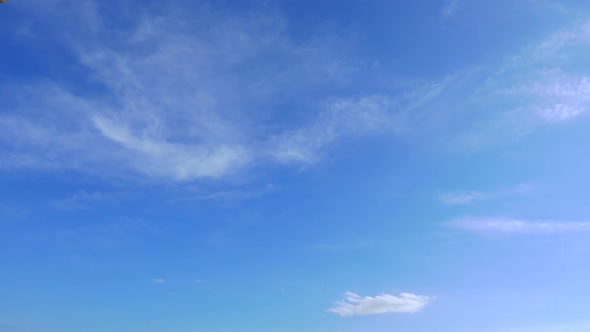 Time lapse of white cloud moving pass around sky background