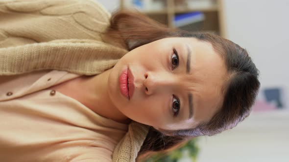 Sick Asian Woman Having Video Call at Home