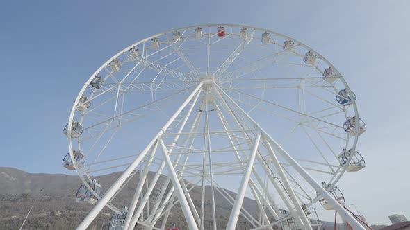 Bottom View of White Ferris Wheel