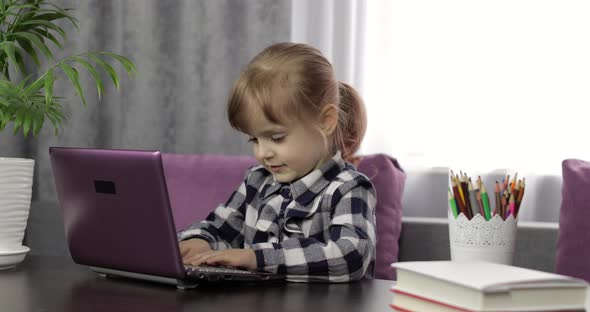Girl Studying Online Homework Using Digital Laptop Computer, Distance Education