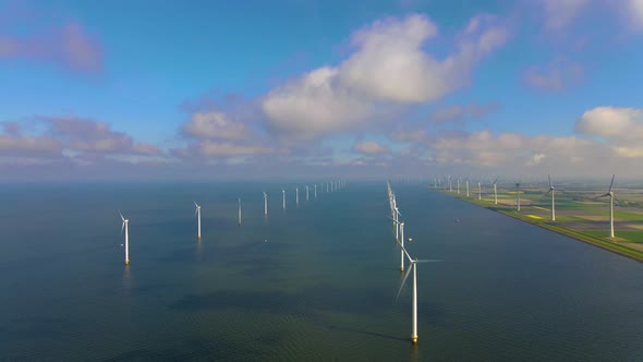 Wind Turbines in the Early Morning Wind Mill Park in the Netherlands