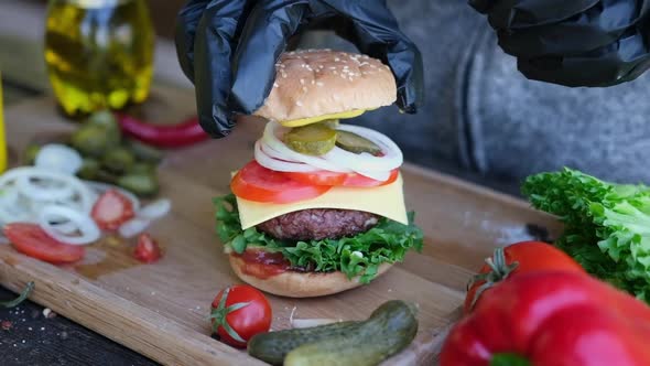 Making Burger  Putting Second Half of a Bun Finishing Sandwich Assembling