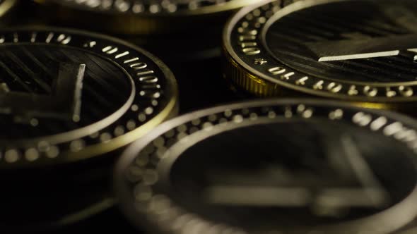 Rotating shot of Bitcoins (digital cryptocurrency) - BITCOIN LITECOIN 223